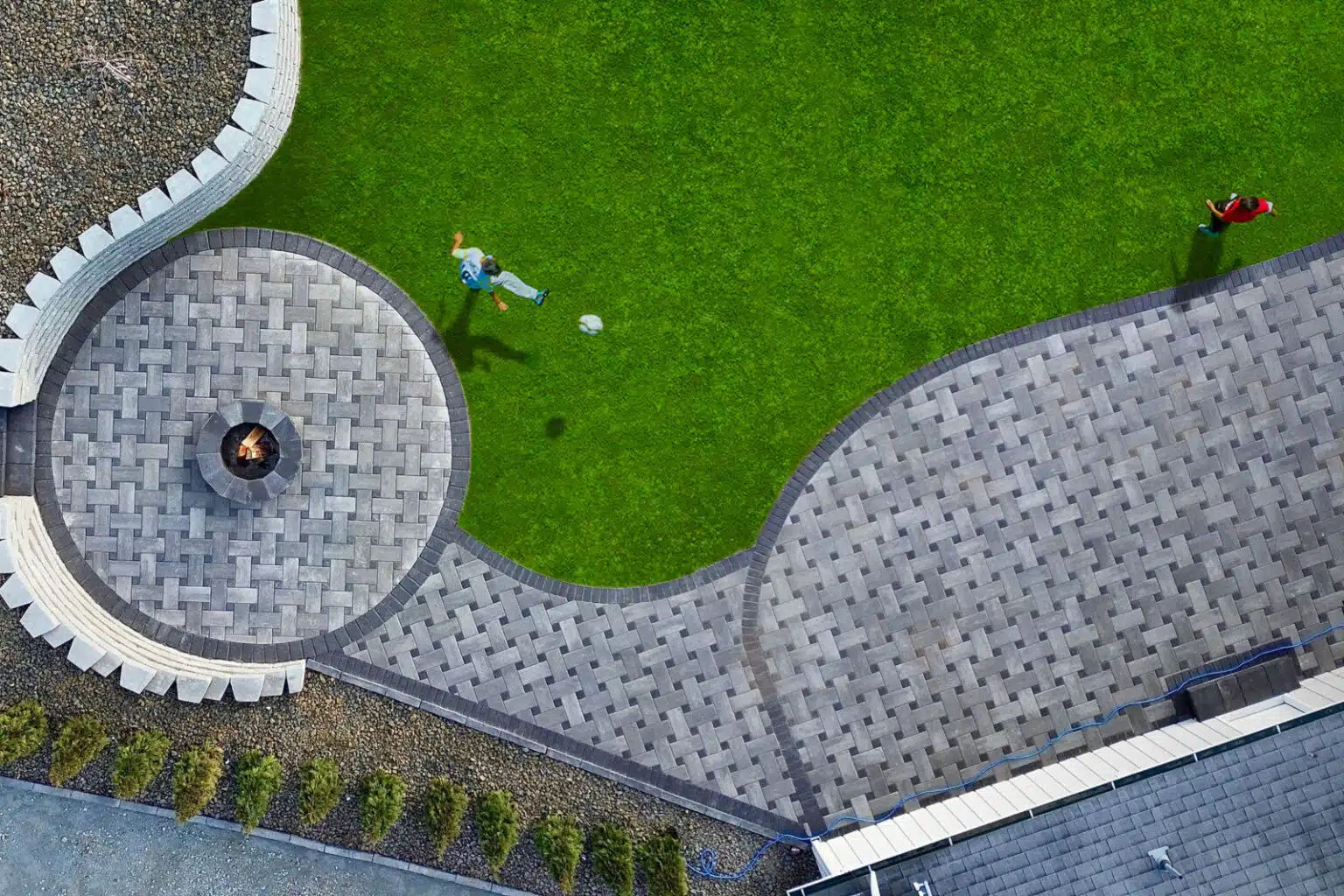 Double Park Concrete Paver Charcoal Patio and Grass Example